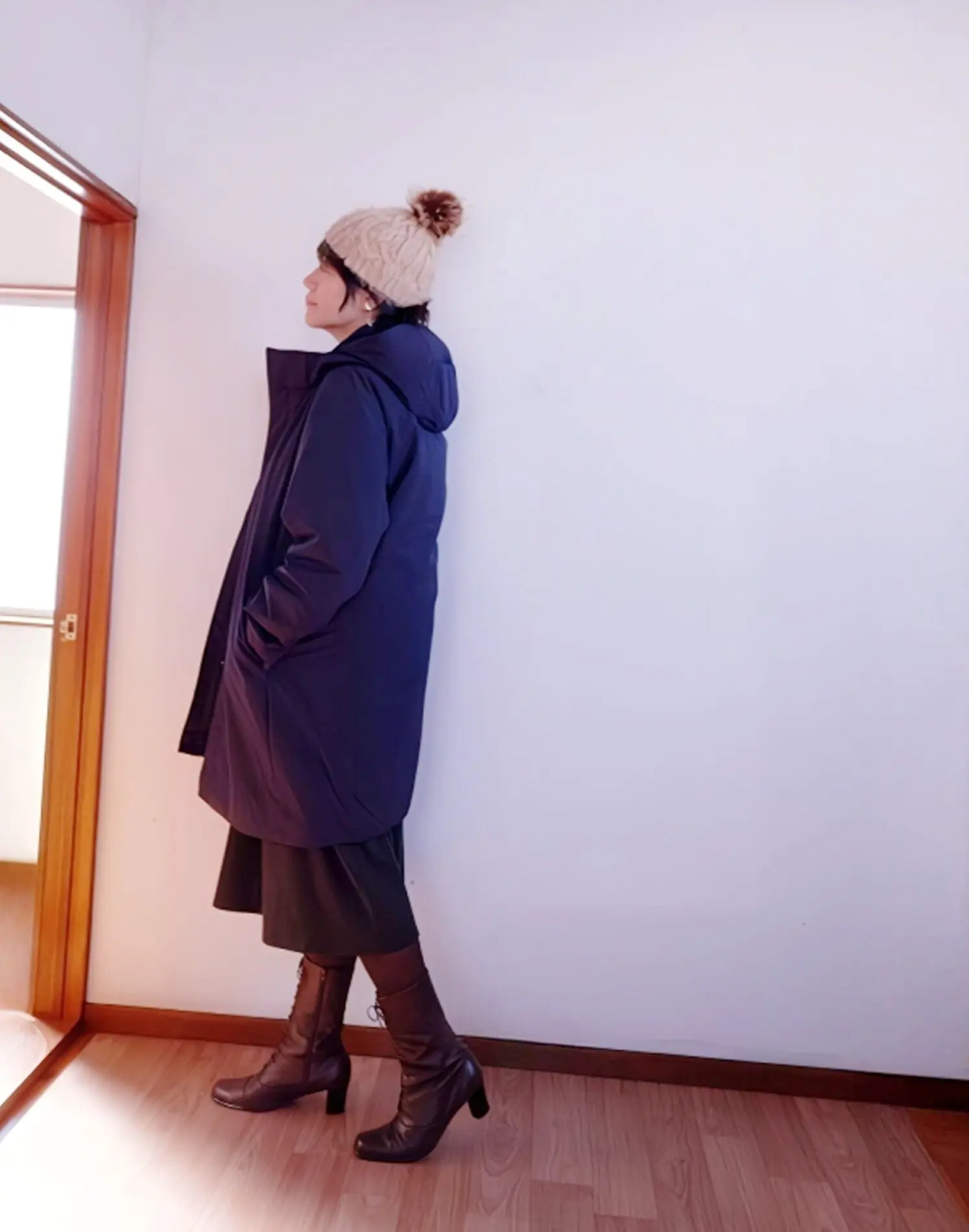 ユニクロハイブリッドダウンコート横向きの私