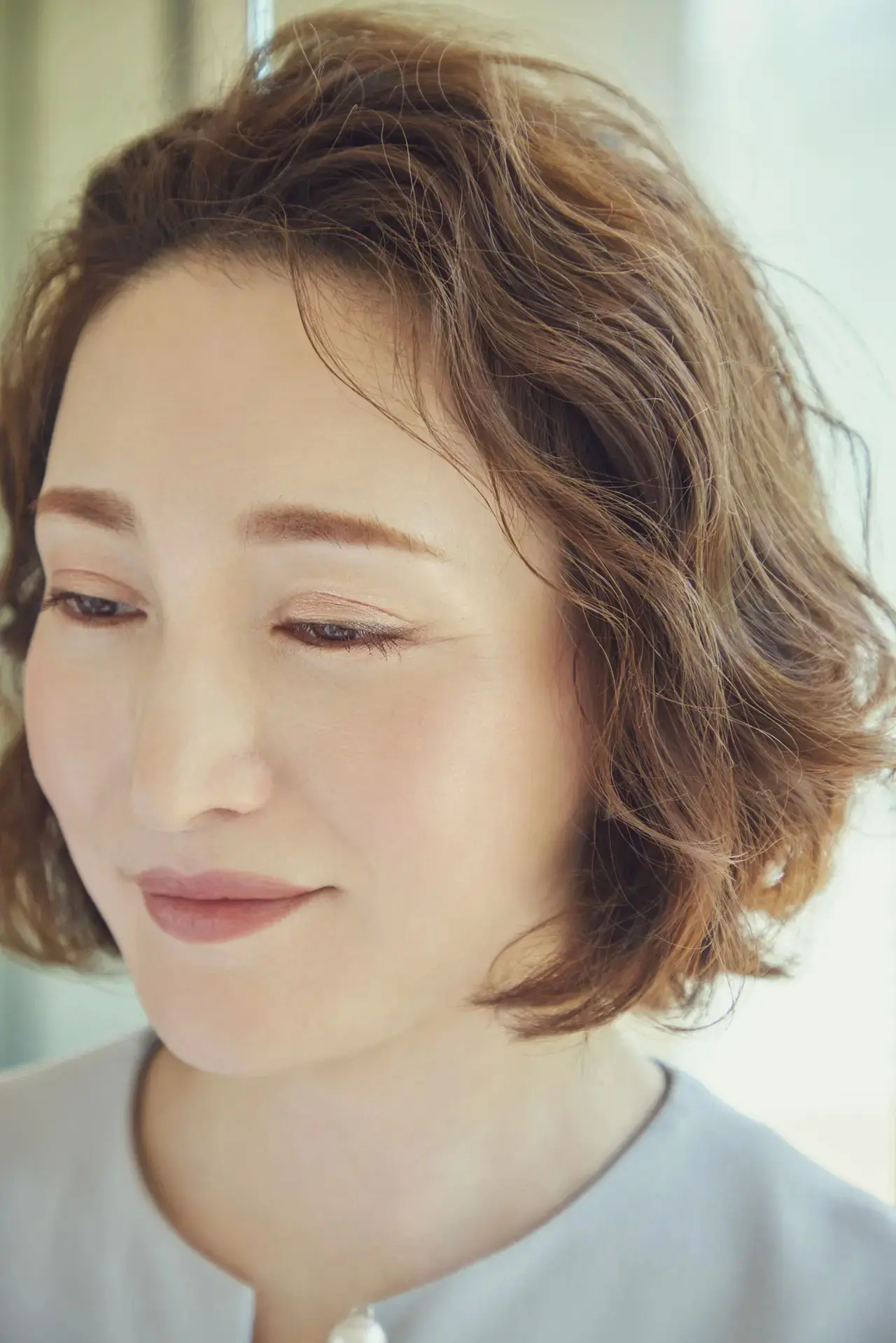 くせ毛を今どきのニュアンスにチェンジ！ パーマで魅せる優しげボブ【50代髪型・ヘアスタイル】