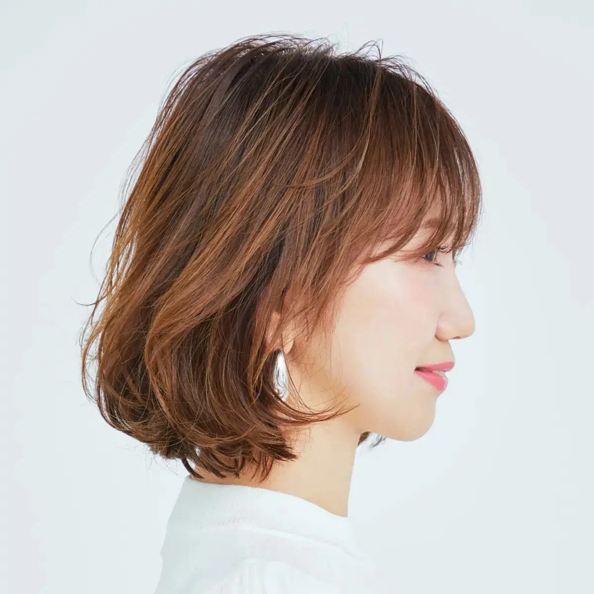 柔らかい丸みと抜け感がおしゃれなボブヘア
