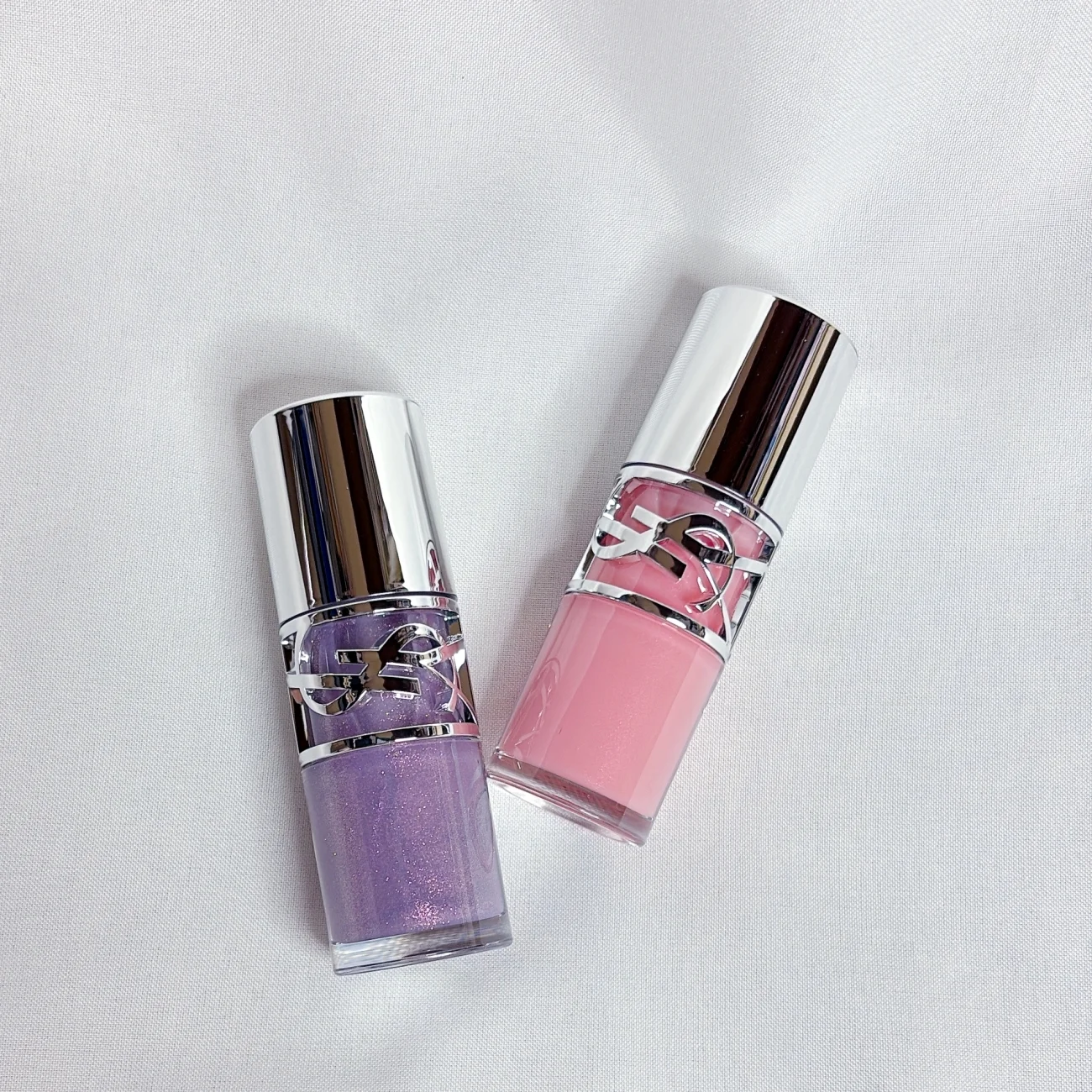 新作コスメ 夏新色 YSL イヴサンローラン 新リップ おすすめ ラベンダーシェードのNo.1(左)か、多幸感あふれる血色ピンクのNo.2(右)を手に入れるのがおすすめ! YSL ラブシャイン グロスプランパー 全10色 各¥4950/イヴ・サンローラン ボーテ<7月11日(金)全国発売> *7月2日(水)より表参道フラッグシップ ブティック・公式オンラインブティックにて先行発売