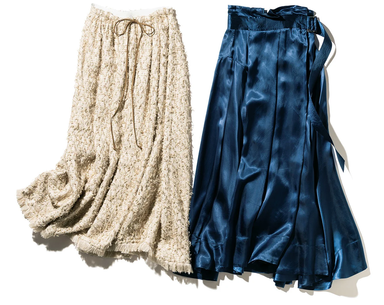 磯部のツヤ素材のラップスカート、三尋木のツイードのフレアスカート