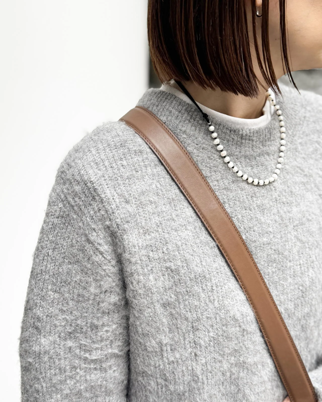 モヘア混ふわ軽コンパクトニット　ネックレスのコーデ