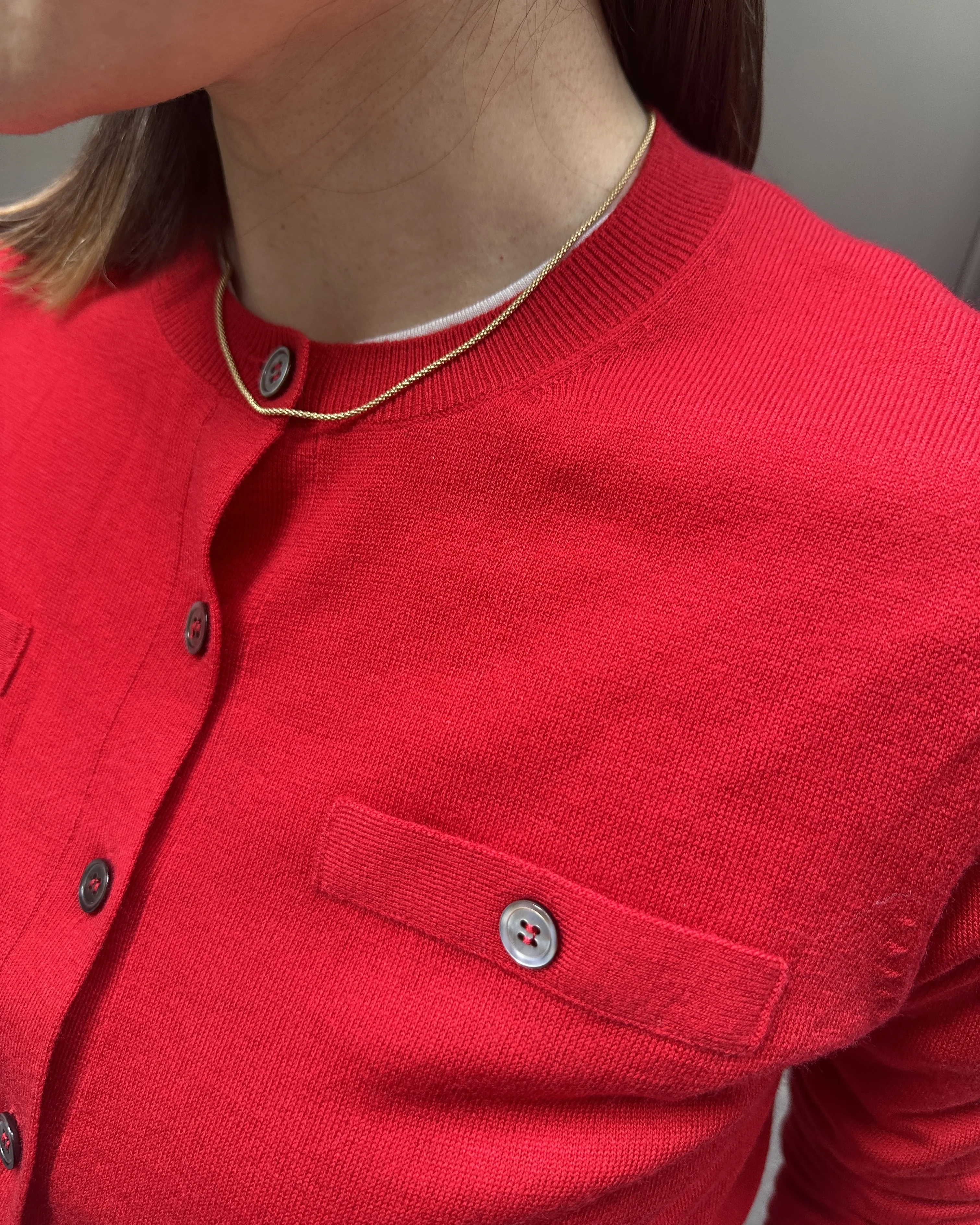 フェイクポケットつきカーディガン